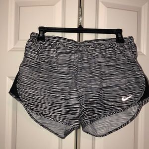 Black and white Nike running shorts